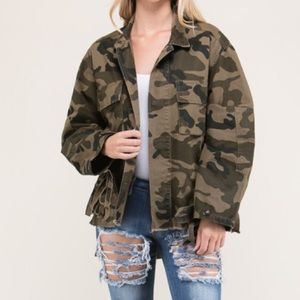 A twist on the camo jacket with fringe and studs